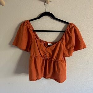 Burnt orange off the shoulder babydoll top